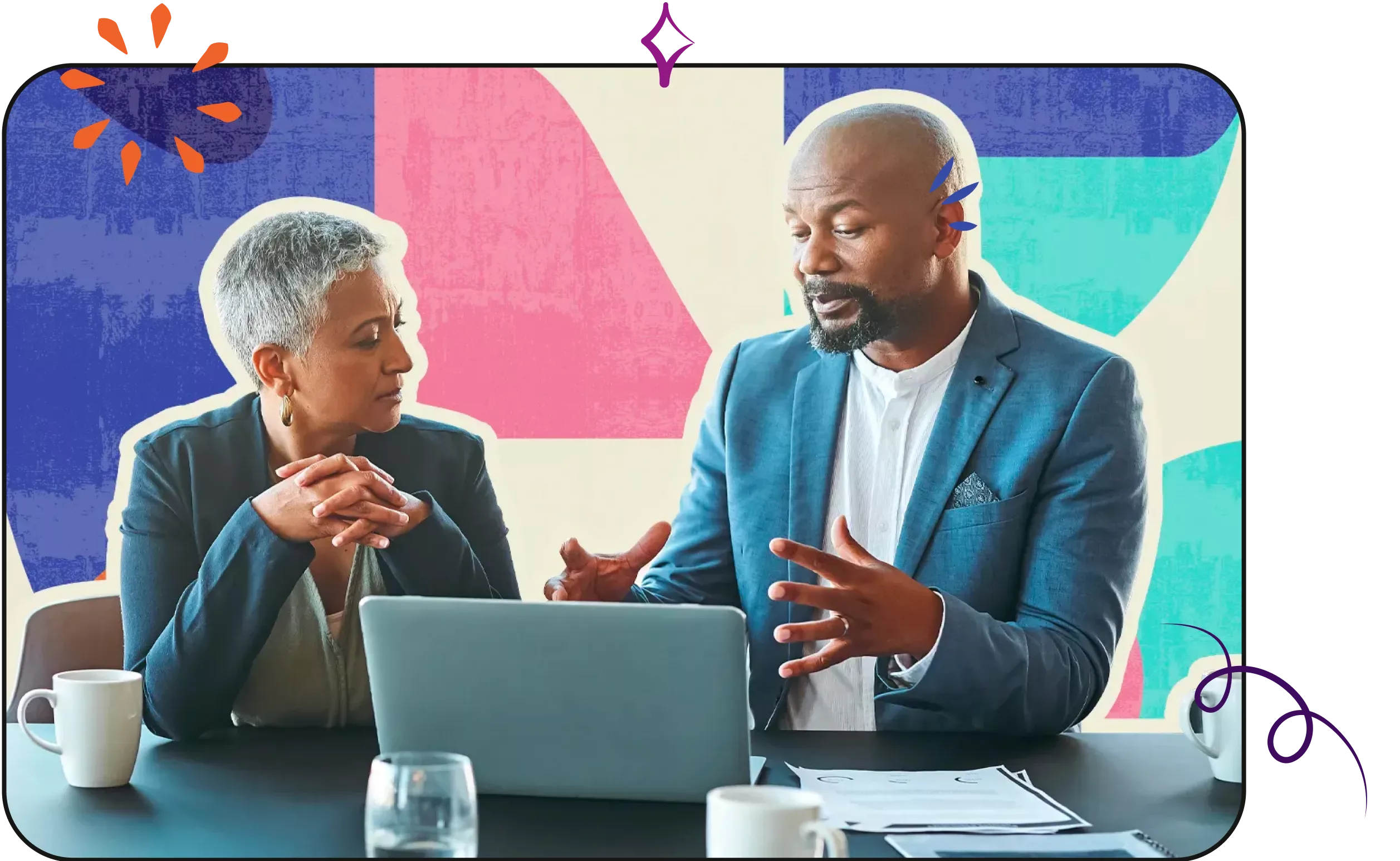 White business woman and Black colleague at table with laptop in conversation